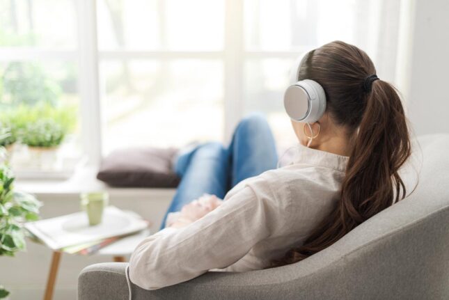 Woman listening to personalised RTT recording